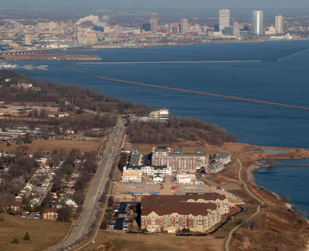 Over 20 acres along the St. Francis lakefront, between the FBI offices and Park Shore condominiums, has been sold to investors.