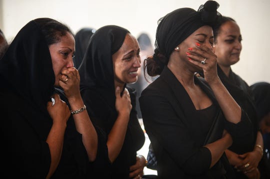 Women mourn during a memorial ceremony for the seven crew members who died in the Ethiopian Airlines accident at the Ethiopian Pilot Association Club in Addis Ababa, Ethiopia, on March 11, 2019.
