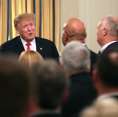 President Donald Trump addresses a meeting of the...