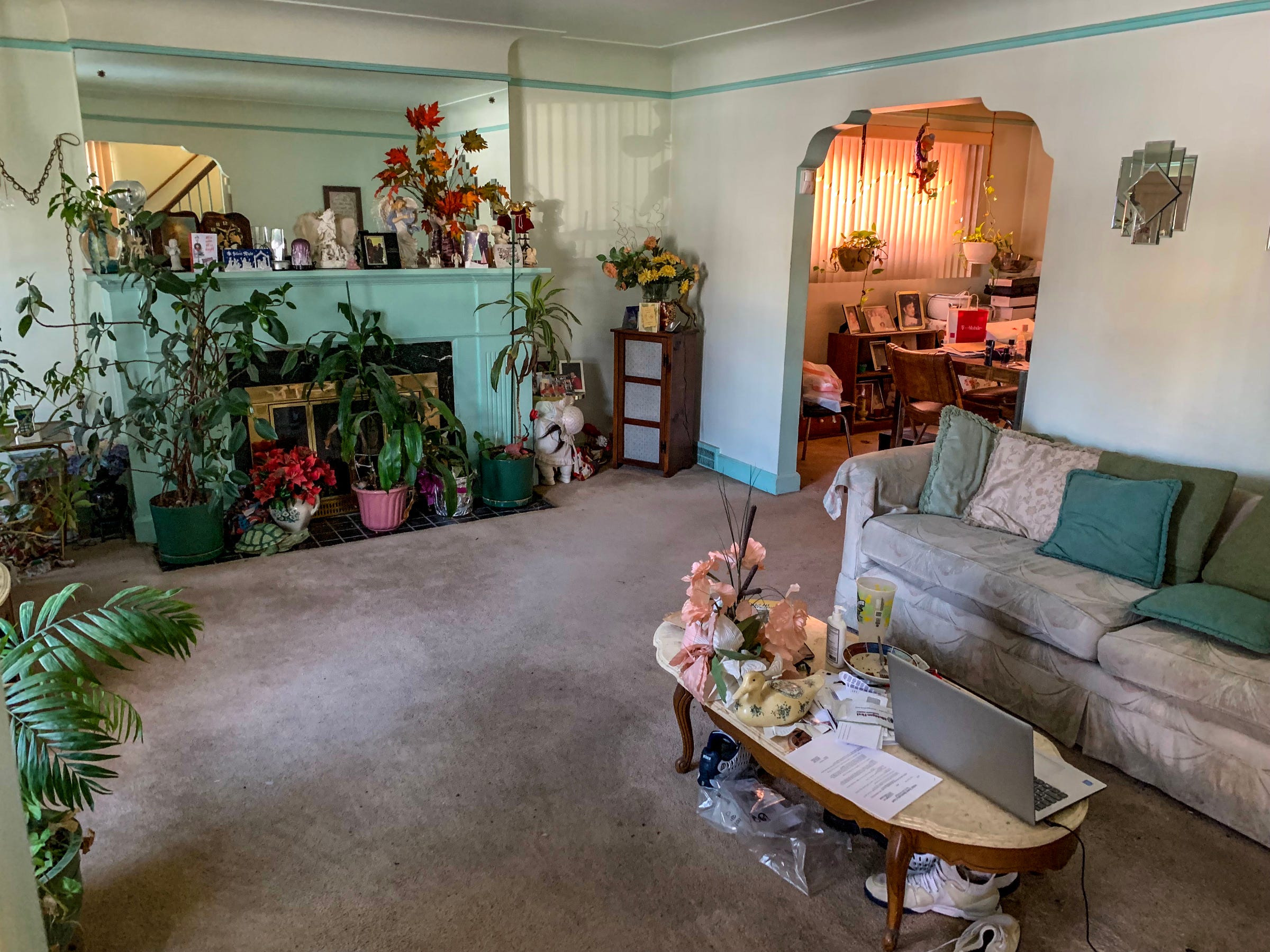 The living room of Lorenzo Slade's home on Roselawn street in Detroit, Thursday, Feb. 21, 2019. Slade has lived here at his grandmother's home for over 40 years, but recently lost his house to tax foreclosure this year over a debt of just over $3,000. FPJ Investment, who bought the house from the Wayne County Land Bank, says Slade is ineligible to buy his house back, through the "Action before Auction" program, because he was late in paying his DTE bill.