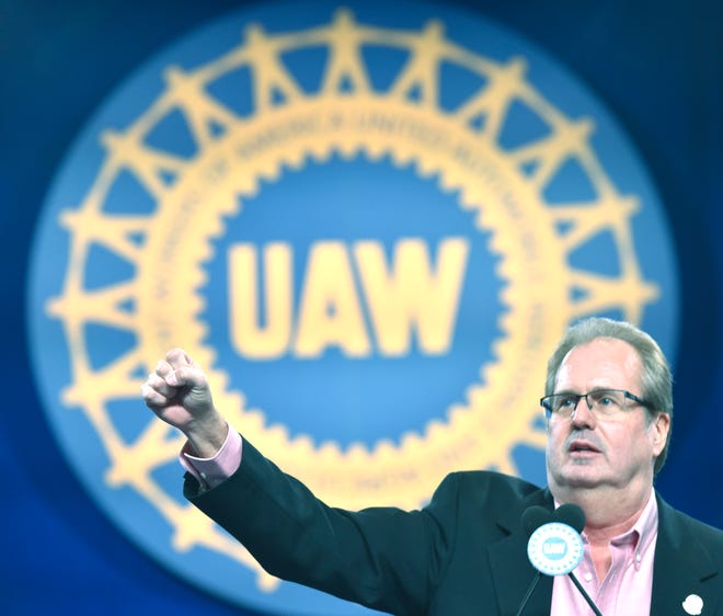 UAW President Gary Jones fires up delegates as he starts the chant, 'We Are One,' during his keynote speech.