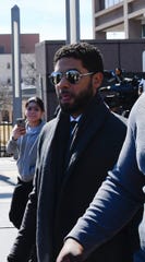 Empire actor Jussie Smollett, in the center, leaves the Leighton Criminal Court building after a hearing held on Tuesday, March 12, 2019 in Chicago. A Smollett lawyer said Tuesday that she would be hosting the cameras in the courtroom during the trial. 