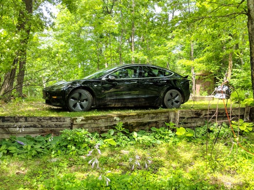 A Model 3 trickle charging in the North Woods of Minnesota.