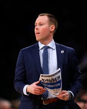 Xavier Musketeers head coach Travis Steele coaches against the Creighton Bluejays during the second half of a quarterfinal game of the Big East conference tournament at Madison Square Garden.