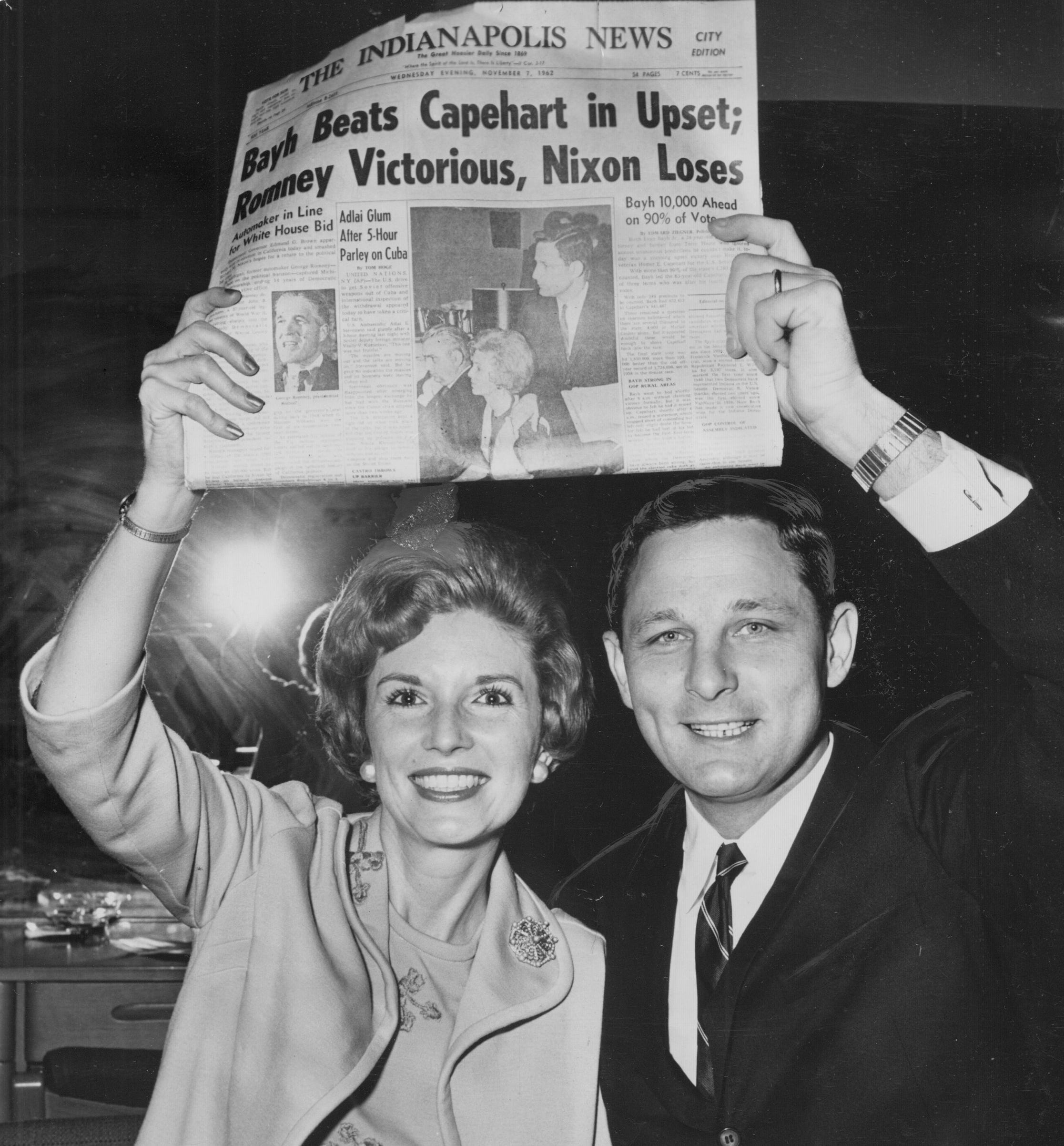 Senator-elect Birch Bayh Jr. and his wife, Marvella hoist a first edition of The News proclaiming his narrow victory over incumbent Republican Homer E. Capehart on Nov. 7, 1962,