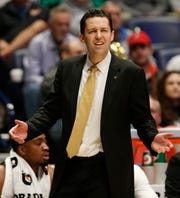 Vanderbilt Head Coach Bryce Drew watches the action during the first half of the SEC Men's Basketball Tournament at Bridgestone Arena in Nashville, Tennessee on Wednesday, March 13, 2019.