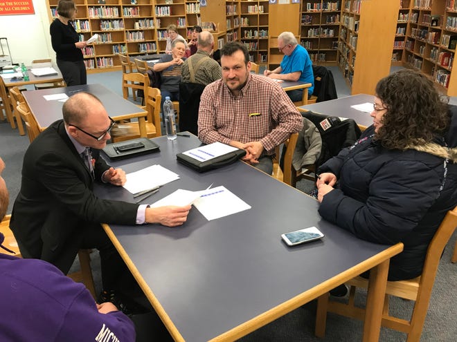 About a dozen people came to a meeting March 13 at Adams Upper Elementary to receive information and provide feedback to the Wayne-Westland Community School District on closing an upper elementary or middle school next year.