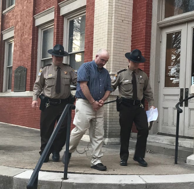 Darin Davis is led away from the Augusta County Courthouse on Wednesday after being convicted of voluntary manslaughter.
