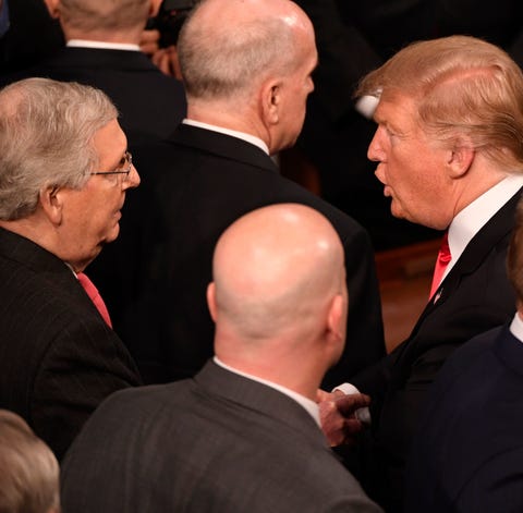 President Donald Trump and Sen. Mitch McConnell,...
