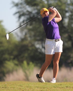 University of Mary Hardin-Baylor golfer Cassidy Rawls watches her tee shot. The Snyder grad has played a key role with the UMHB golf women's golf program.
