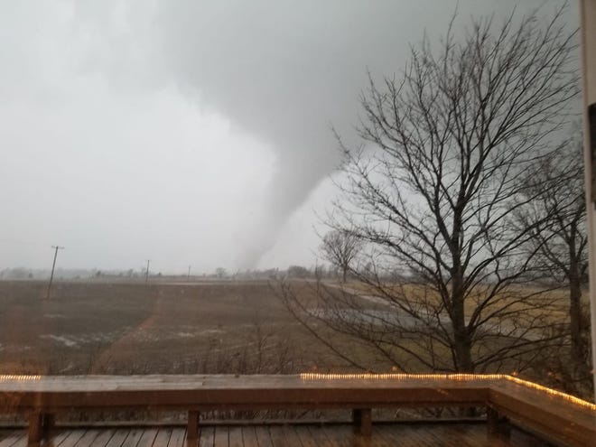 A tornado that touched down in Vernon at about 7:03 p.m. Thursday is likely the same twister that was spotted in nearby Durand at about 7:05 p.m., the National Weather Service said. Patricia Rothney took this photo of the tornado spotted on Newberry Road in Durand.