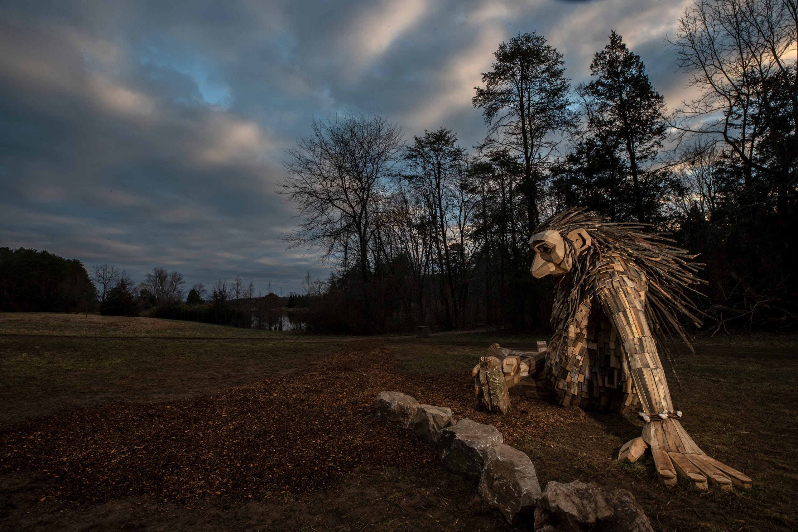 Little Elina, one of three giant trolls, reclines in a field in Bernheim Forest. March 15, 2019.