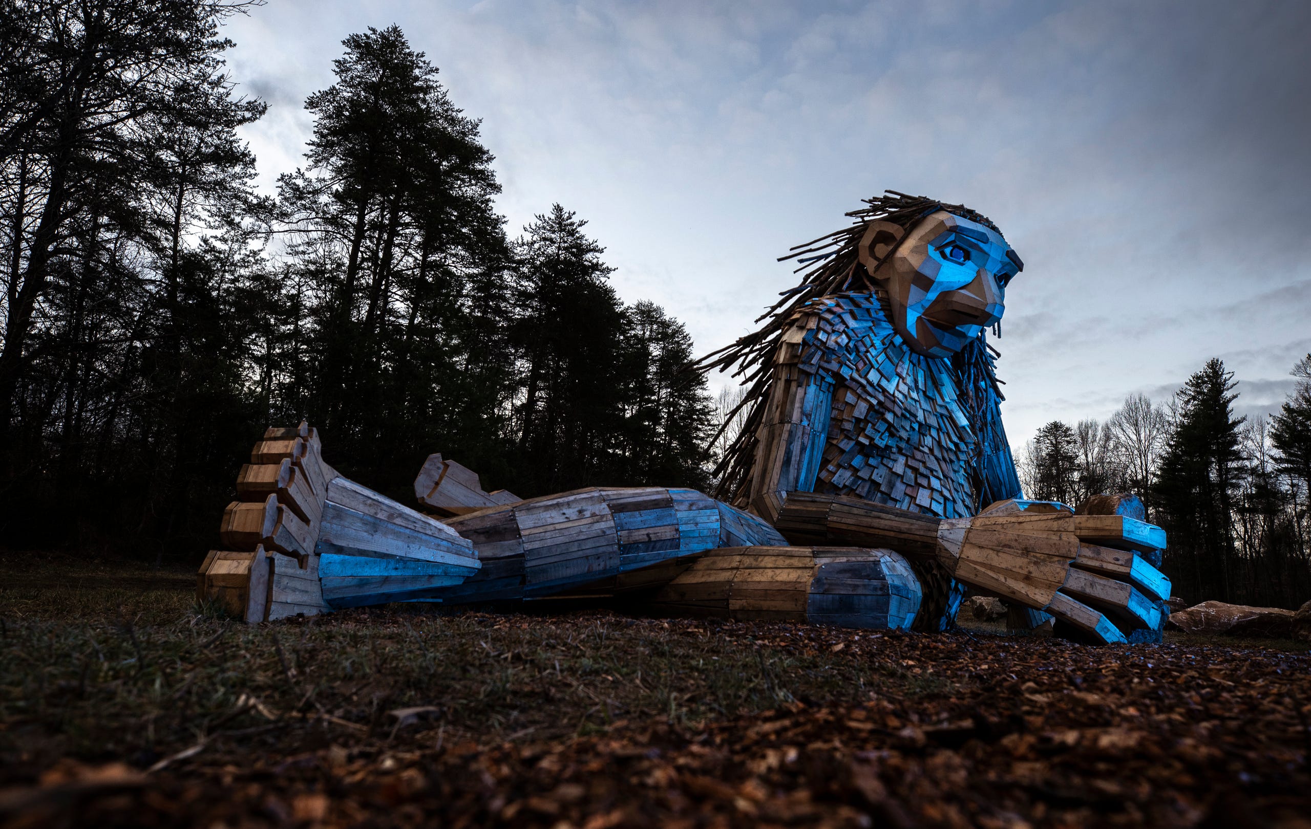 Little Elina, one of three giant trolls, reclines in a field in Bernheim Forest. March 15, 2019.