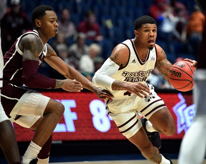 Mississippi State guard Lamar Peters (2) moves the ball defended by Texas A&M guard Wendell Mitchell (11) during the second half of the SEC Men's Basketball Tournament game at Bridgestone Arena in Nashville, Tenn., Thursday, March 14, 2019.