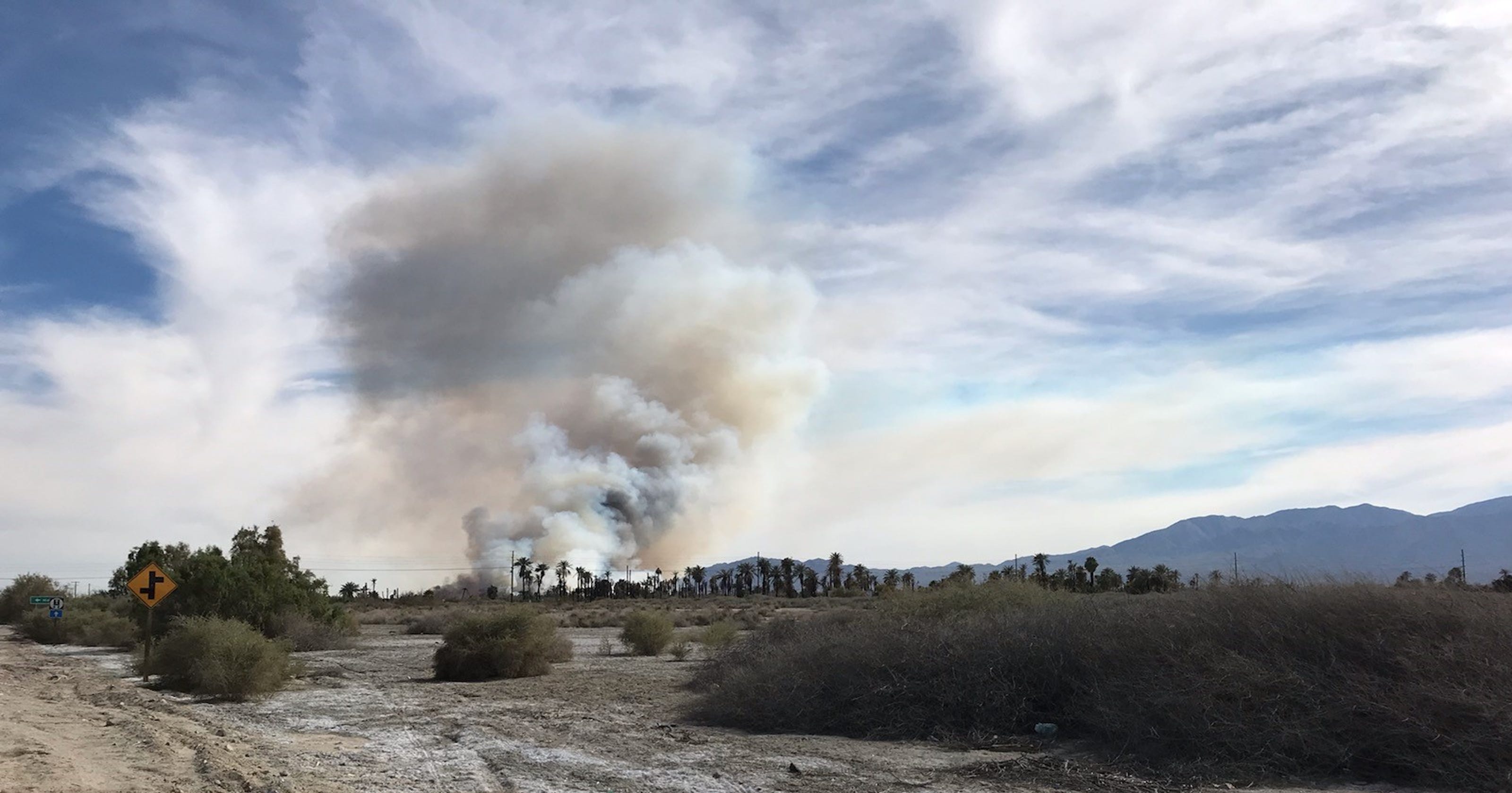 Firefighters battling fastmoving brush fire in Mecca
