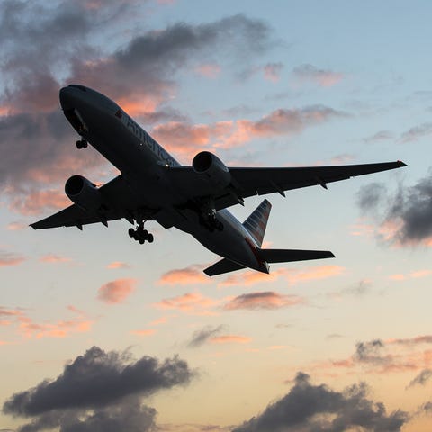 An American Airlines Boeing 777 takes off from...