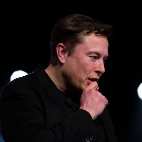 Tesla CEO Elon Musk pauses while speaking before...