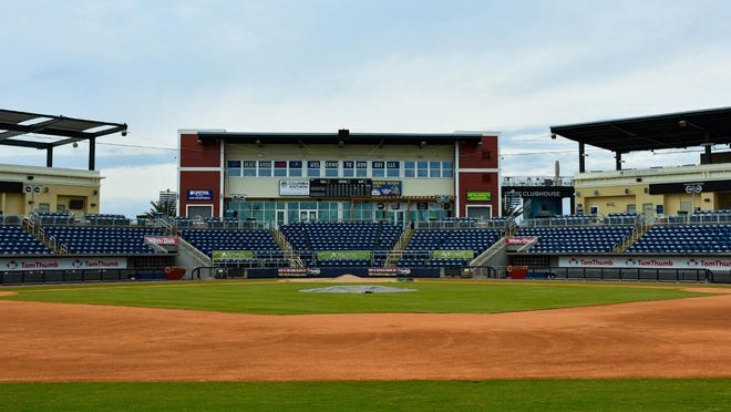 The team from River Region Sports Fields in Millbrook, Ala. installs new sod for the infield and foul line areas at Blue Wahoos Stadium.