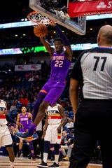 Mar 16, 2019; New Orleans, LA, USA; Phoenix Suns center Deandre Ayton (22) dunks the ball against New Orleans Pelicans during the first half at Smoothie King Center.