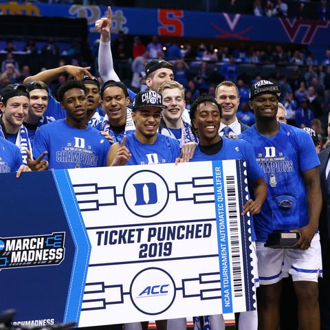 Duke players celebrate after defeating Florida Sta