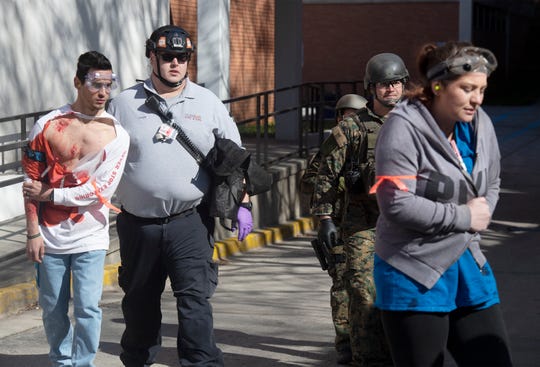 Emergency personnel from Clemson University and surrounding areas participate in an active shooter exercise at Daniel Hall Tuesday, Mar. 19, 2019.