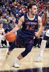 Feb 9, 2019; Spokane, WA, USA; St. Mary's Gaels guard Tommy Kuhse (12) runs the baseline against the Gonzaga Bulldogs in the first half at McCarthey Athletic Center. Mandatory Credit: James Snook-USA TODAY Sports