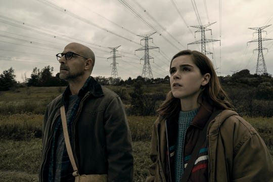 Stanley Tucci, left, and Kiernan Shipka star in the April Netflix horror film, 'The Silence.'