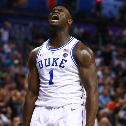 Duke forward Zion Williamson celebrates a play...