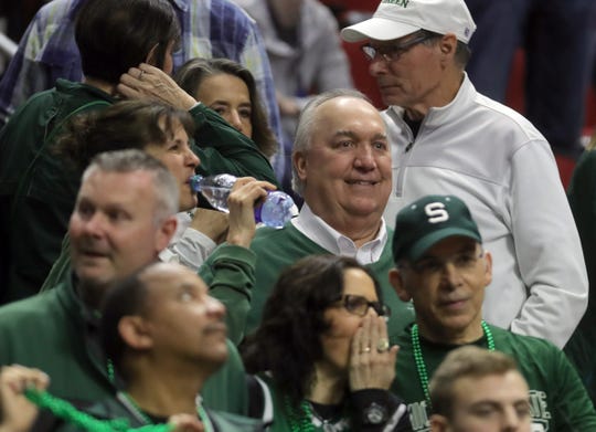 Former Michigan governor John Engler attends the Michigan State-Bradley NCAA tournament game on Thursday, March 21, 2019 at Wells Fargo Arena in Des Moines, Iowa.