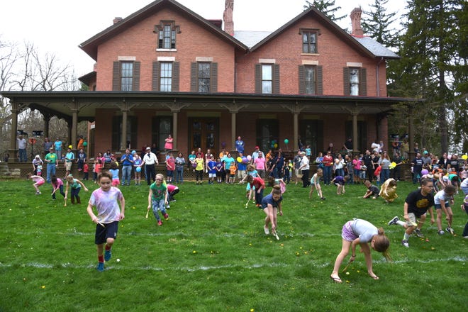 Kids can play traditional egg games on the lawn of the Hayes Home in Fremont during the annual egg roll.