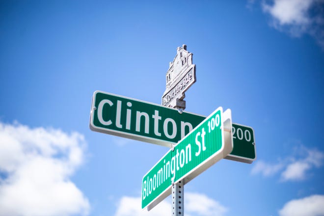 A placard for the Northside District above the intersection of Clinton and Bloomington Streets, Thursday, March 21, 2019, along Clinton Street in Iowa City, Iowa.