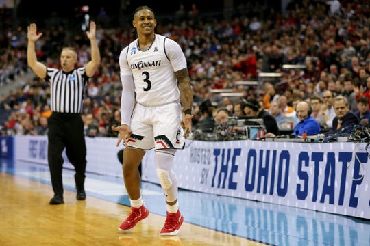 Cincinnati Bearcats guard Justin Jenifer (3) reacts after a made 3-point basket in the first half of the NCAA Tournament Round of 64 game against the Iowa Hawkeyes, Friday, March 22, 2019, at Nationwide Arena in Columbus, Ohio. 
