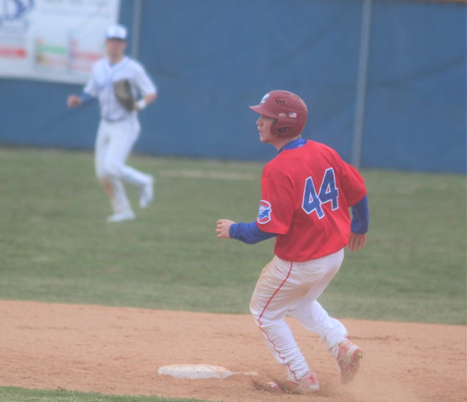 Conner junior Alex Borman arrives safely at second base as Highlands beat Conner 8-7 in baseball March 20, 2019 at Highland Hills Park, Fort Thomas KY.