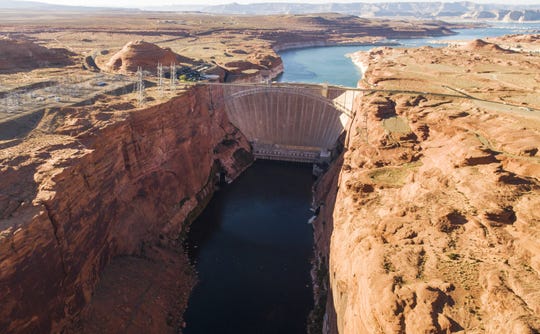 Glen Canyon Dam, near Page, permanently altered the flow of the Colorado River through the Grand Canyon, turning the flow from warm and muddy to cool and clear.