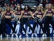 First round: The Montana cheerleaders perform during the game against Michigan.