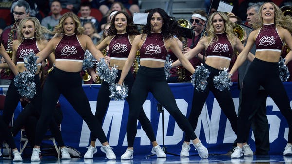 First round: The Montana cheerleaders perform...