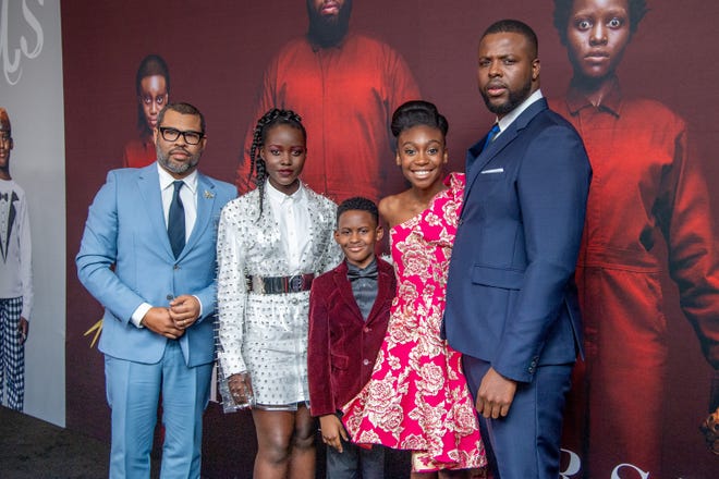 Shahadi Wright Joseph (second from right) attends the "Us" premiere with director Jordan Peele and co-stars Lupita Nyong'o, Evan Alex and Winston Duke.