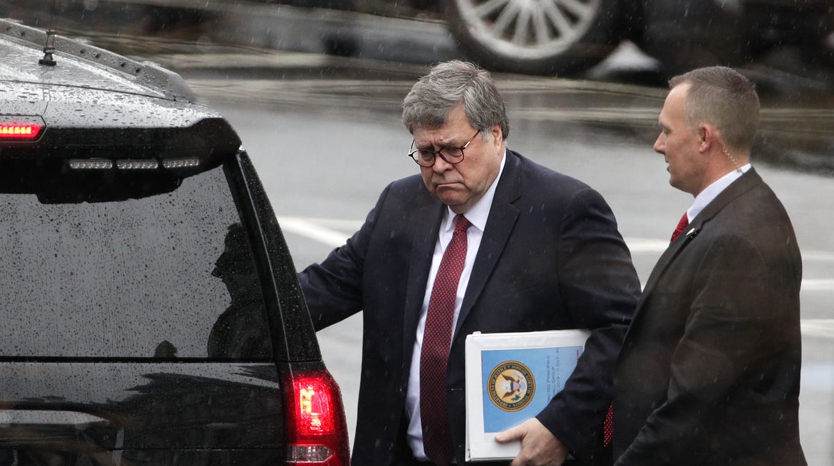 Attorney General William Barr, left, leaves after a meeting at the West Wing of the White House March 21, 2019 in Washington, DC. Key law-enforcement officials in Washington are preparing for the release of the report by special counsel Robert Mueller. 