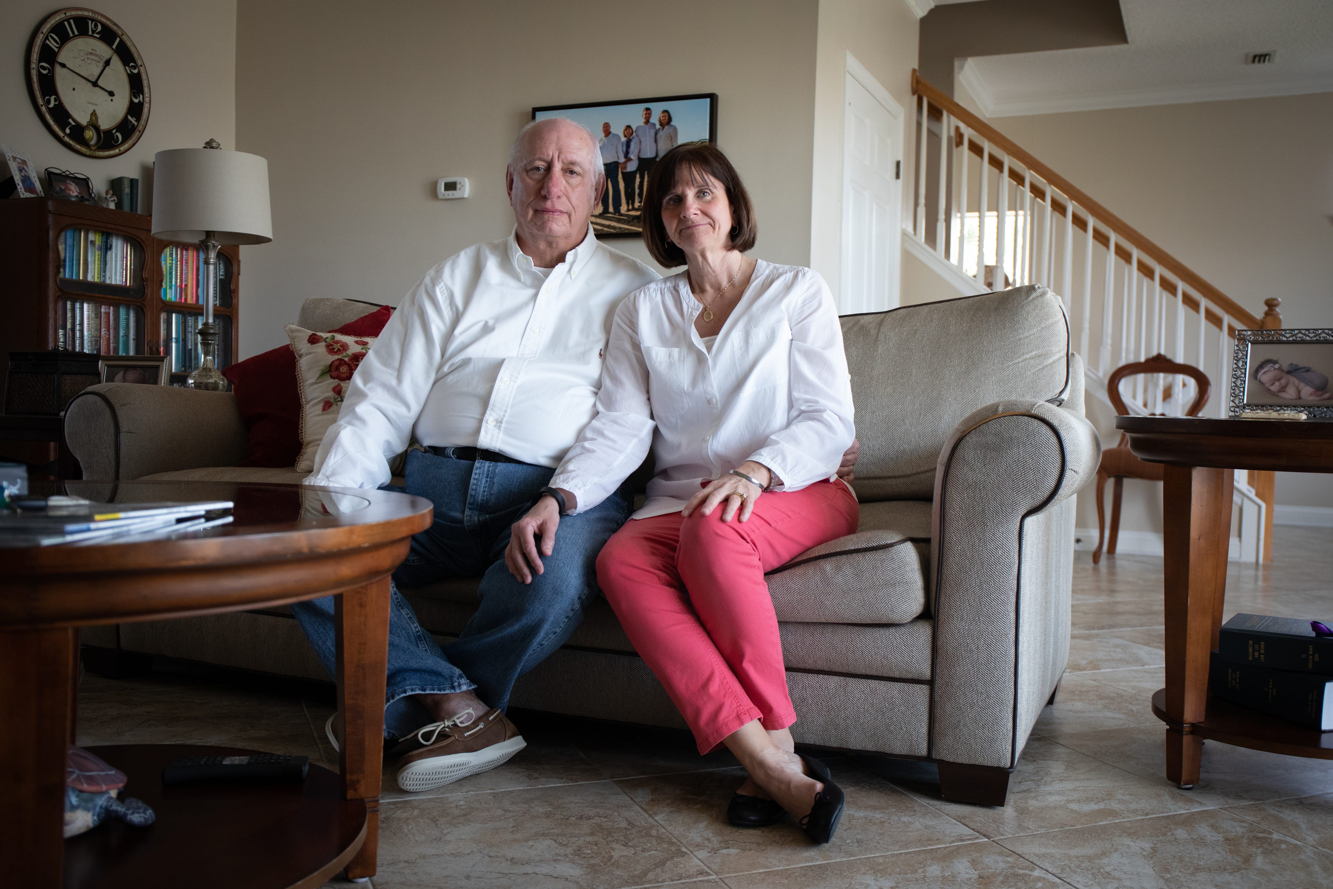 Jay and Gerri Gass, on the fifth anniversary of their daughter's death, pose for a portrait in their home in Ponte Vedra Beach, Fla. on March 18, 2019. Lara Gass died at age 27 in 2014 in a car crash caused by a faulty ignition switch.