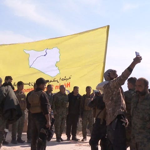 An image grab released by the Kurdish Ronahi TV...