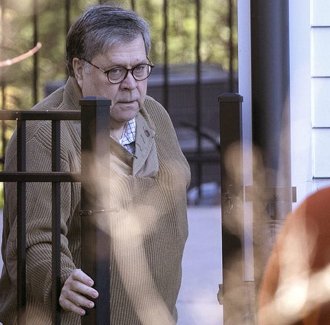 U.S. Attorney General William Barr departs his...