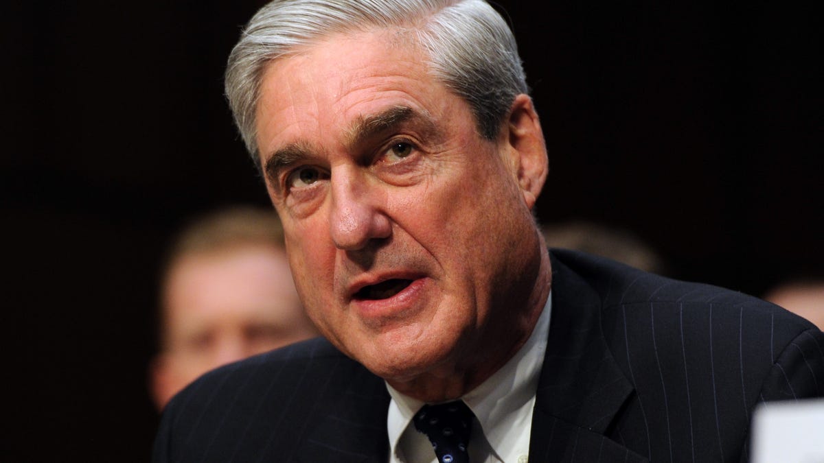 Former FBI Director Robert Mueller is pictured testifying at a Senate Intelligence Committee hearing on worldwide threats.