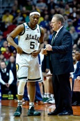 Michigan State coach Tom Izzo talks with guard Cassius Winston in the first half against Minnesota in the second round of the NCAA tournament at Wells Fargo Arena, March 23, 2019.