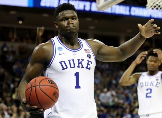 Duke's Zion Williamson reacts after a basket against UCF during the second half in the second round game of the NCAA tournament at Colonial Life Arena on March 24, 2019 in Columbia, SC.