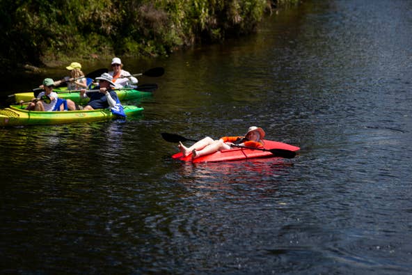 Kristian Hustrulid relaxes in his kayak at Riverside Park in Bonita Springs on Sunday, March 24, 2019.