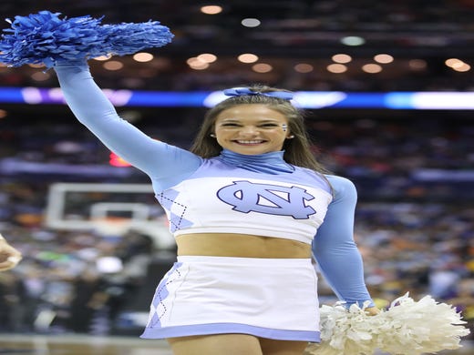Round of 32: A North Carolina Tar Heels cheerleader performs.