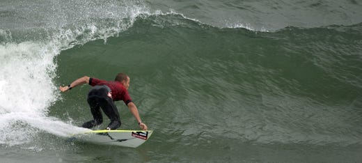 2008: In the fourth day of the Sebastian Inlet Pro Surfing, C.J. Hobgood takes his turn on his heat for the day.
