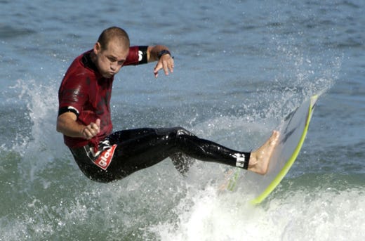2008: In the fifth day of the Sebastian Inlet Pro Surfing C.J. Hobgood cuts back off the wave.