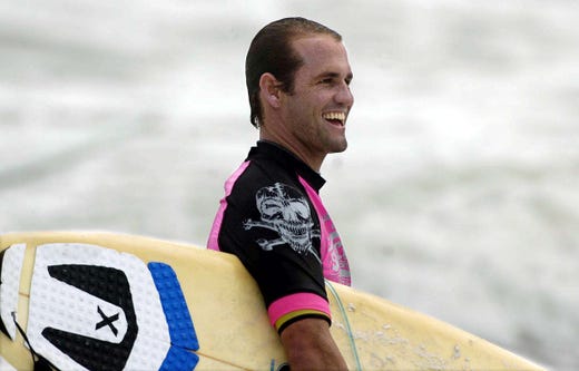 2009: CJ Hobgood of Satellite Beach enjoys himself at the Slater Brothers invitational surf event as crowds pack the beach behind Coconuts on the Beach as they watch local surf stars like Kelly Slater of Cocoa Beach and CJ Hobgood of Satellite Beach Sunday afternoon in Cocoa Beach.
