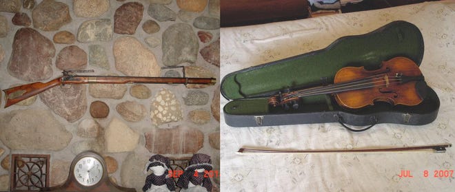 Authorities say someone stole a replica rifle and antique violin from the building.